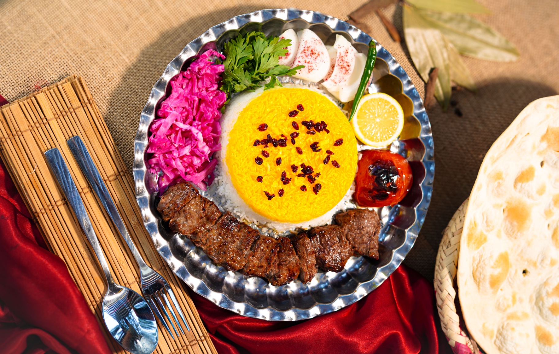 Chenjeh kebab — cubed marinated lamb with saffron rice