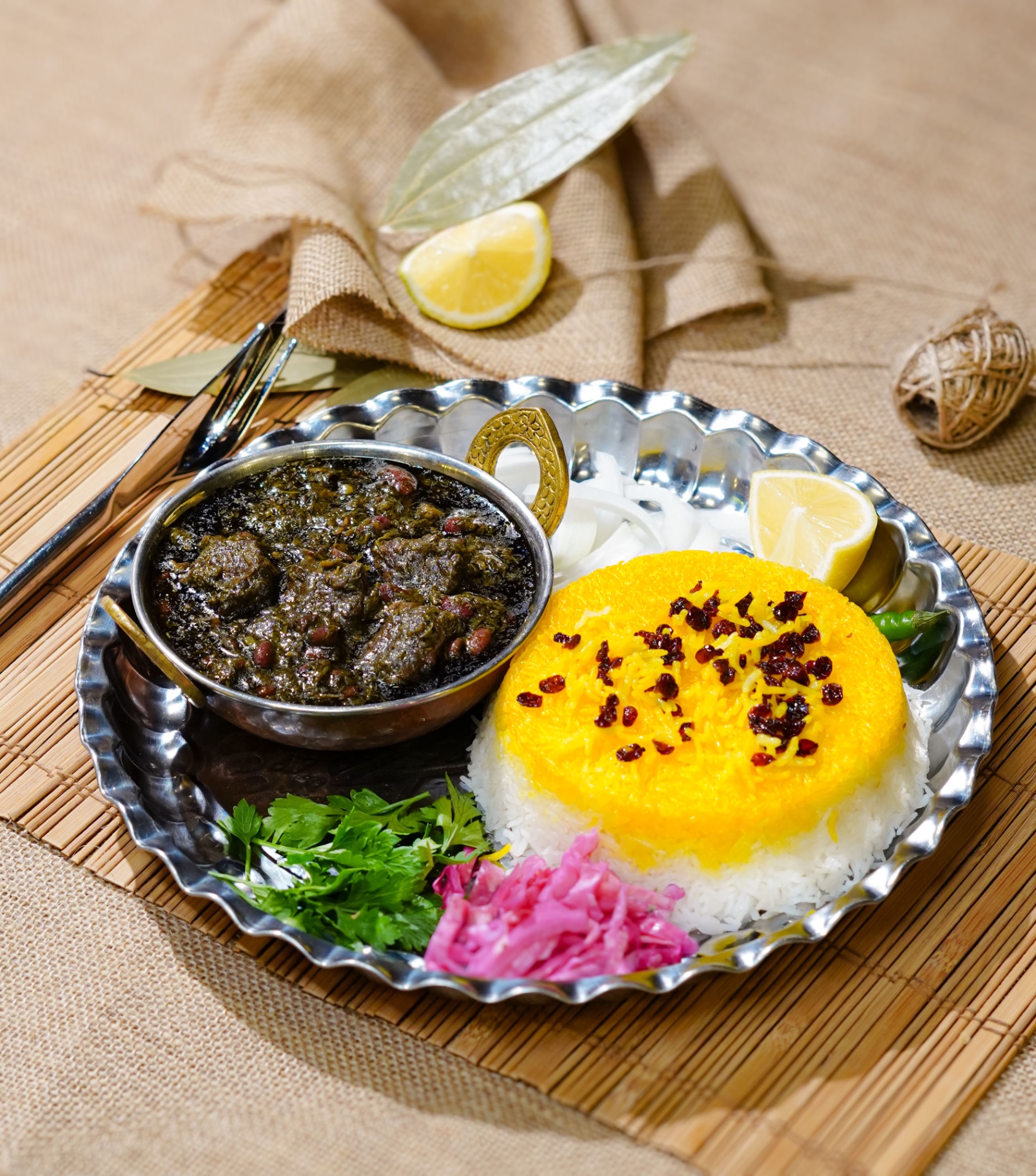 Ghormeh Sabzi — slow-braised herb and lamb stew with tahdig
